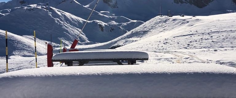 Snow covered bench in Courchevel 1650 in the French Alps