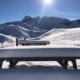 Snow covered bench in Courchevel 1650 in the French Alps