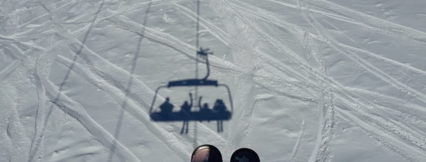 skis chairlift shadow